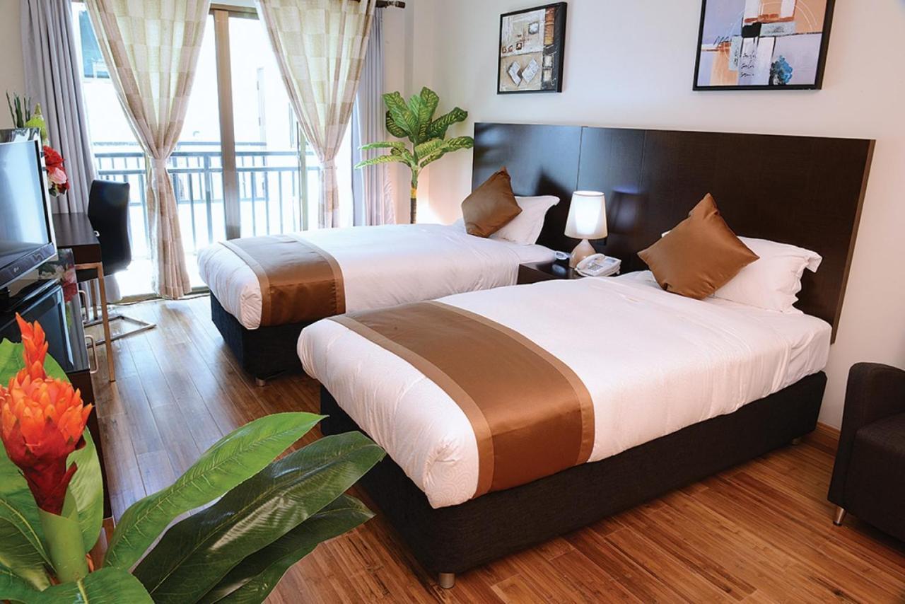 דילי Timor Plaza Hotel & Apartments מראה חיצוני תמונה