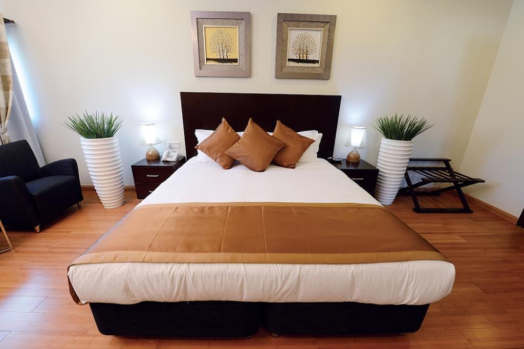 דילי Timor Plaza Hotel & Apartments חדר תמונה