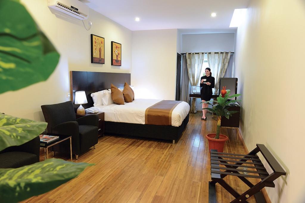 דילי Timor Plaza Hotel & Apartments חדר תמונה