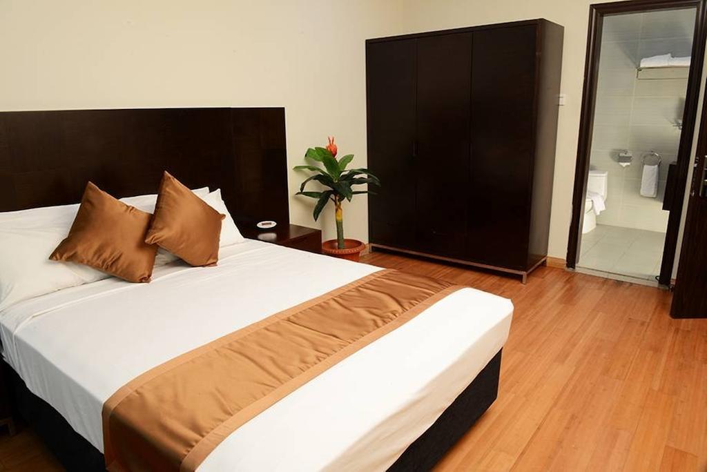 דילי Timor Plaza Hotel & Apartments חדר תמונה