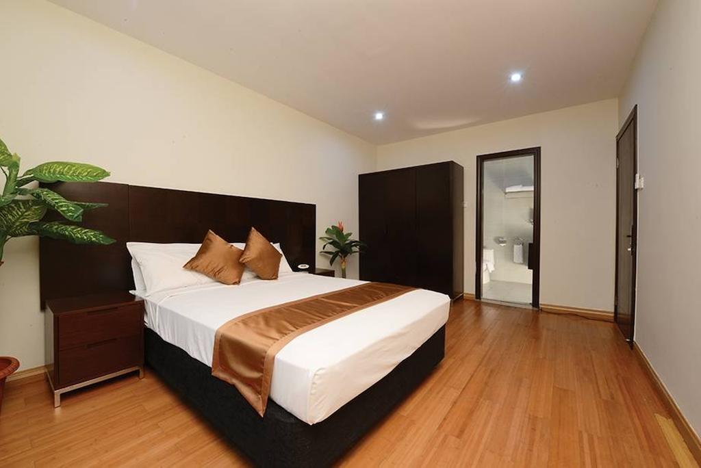 דילי Timor Plaza Hotel & Apartments חדר תמונה